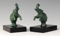 Lot 93 - A pair of Art Deco green patinated spelter...