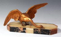 Lot 95 - An Art Deco gilded spelter figure of a swan,...