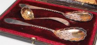 Lot 119 - A cased pair of late Victorian silver serving...