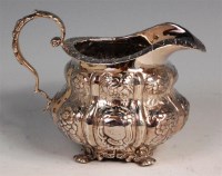 Lot 128 - A George IV Irish silver cream jug, of lobed...