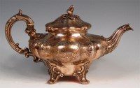 Lot 130 - A Victorian silver teapot, of ribbed and squat...