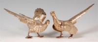 Lot 140 - A pair of silver fighting cocks, each in...