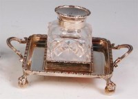 Lot 142 - An Edwardian silver inkwell, of square section,...