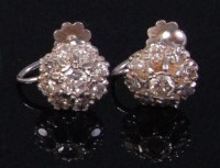 Lot 168 - A pair of white metal diamond cluster ear...