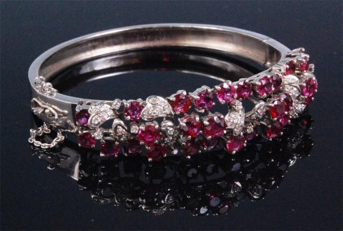 Lot 183 - A contemporary white gold ruby and diamond...