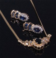 Lot 220 - A contemporary 14ct gold sapphire and diamond...