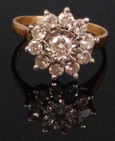 Lot 234 - A ladies 18ct gold diamond cluster ring,...