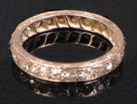 Lot 235 - A ladies white metal diamond eternity ring,...