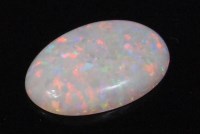 Lot 245 - A single cabochon opal, of good size measuring...