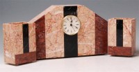 Lot 7 - An Art Deco marble three piece clock garniture,...