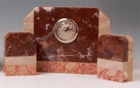 Lot 8 - An Art Deco marble three piece clock garniture,...