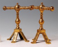 Lot 14 - A pair of Aesthetic movement brass firedogs,...