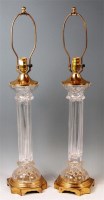 Lot 25 - A pair of gilt brass and heavy moulded crystal...