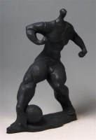Lot 29 - A Cubist style blue glazed ceramic model of a...