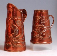 Lot 39 - A Newlyn School style embossed copper single...