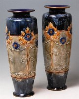 Lot 41 - A large pair of Royal Doulton stoneware vases,...