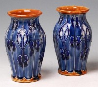 Lot 43 - A pair of Royal Doulton pottery vases, of...