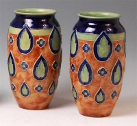 Lot 44 - A pair of Royal Doulton stoneware vases, of...