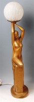 Lot 62 - An Art Deco period gilded plaster table lamp,...