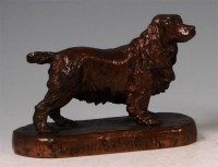Lot 68 - A bronze figure of a standing cocker spaniel,...
