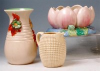 Lot 75 - A Clarice Cliff glazed pottery planter, of...