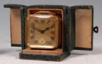 Lot 83 - A French Art Deco brass cased bedside alarm...