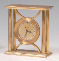 Lot 46 - A 1950s French brass bedside clock, the gilt...