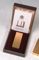 Lot 48 - A Dunhill gold plated pocket cigarette lighter,...