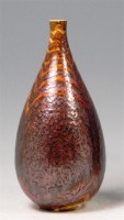 Lot 55 - A 1950s Poole studio glazed pottery bottle...