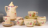 Lot 76 - A Clarice Cliff glazed ceramic four piece...