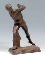 Lot 18 - An early 20th century patinated iron figure of...