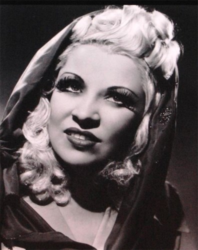 Lot 118 - Angus McBean - Studio portrait of Mae West,...