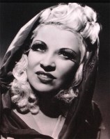 Lot 118 - Angus McBean - Studio portrait of Mae West,...