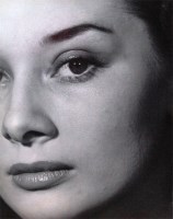Lot 57 - Angus McBean - Audrey Hepburn, close-up...