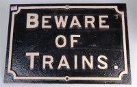 Lot 39 - Cast iron railway sign 'Beware of Trains' with...