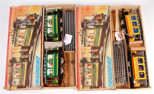 Lot 542 - 2 German 'Trambino' boxed sets of 2 clockwork...