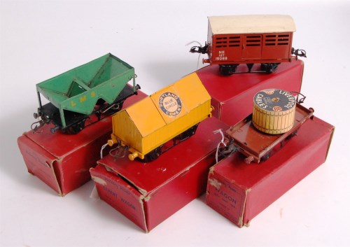 Lot 399 - 4 Hornby wagons on postwar type bases...