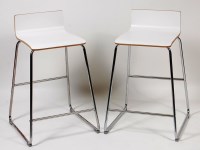 Lot 403 - A pair of modern Danish chrome and laminated...