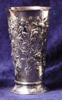 Lot 27 - An Art Nouveau silver embossed vase, of...