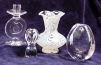 Lot 61 - A Boda clear moulded glass candlestick, having...