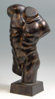 Lot 211 - A contemporary bronzed ceramic model of a male...