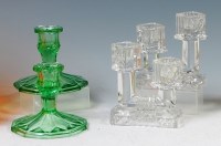 Lot 215 - A pair of George Sakier clear glass moulded...