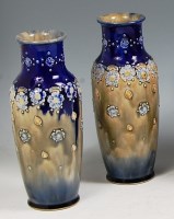 Lot 234 - A pair of Royal Doulton stoneware vases,...