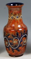 Lot 235 - A Royal Doulton stoneware vase, of baluster...