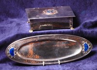 Lot 187 - An Arts & Crafts silver and copper hinged top...