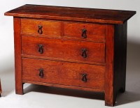 Lot 359 - A Cotswolds School style oak squarefront chest,...