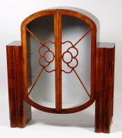 Lot 369 - An Art Deco walnut double door glazed china...