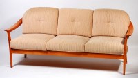 Lot 370 - A 1960s cherrywood three seater settee, by...