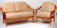 Lot 371 - A 1960s cherrywood two seater settee, by...