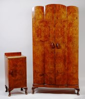 Lot 396 - An Art Deco figured walnut bedroom suite of...